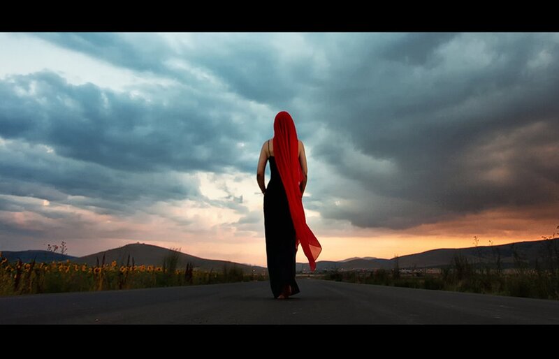 Woman in Red Veil — Dramatic, Sunset
