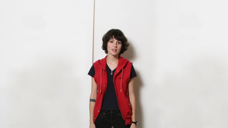 woman in red vest