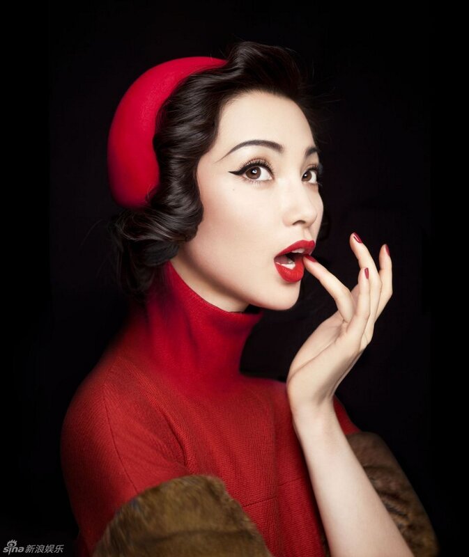 woman in red with bold makeup