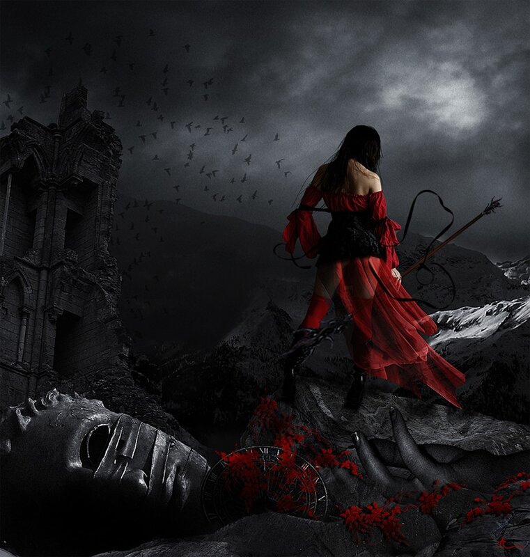 Woman in red with bow on mountain