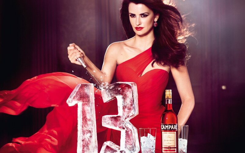 Woman in red with ice sculpture