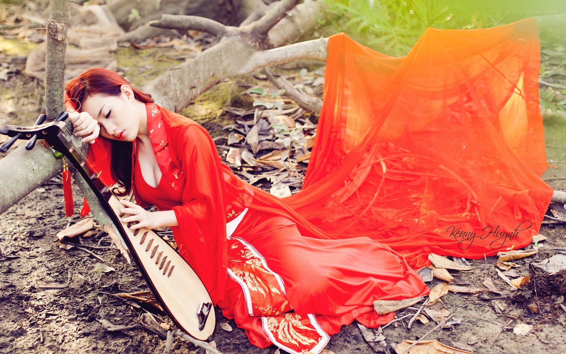 Woman in red with pipa
