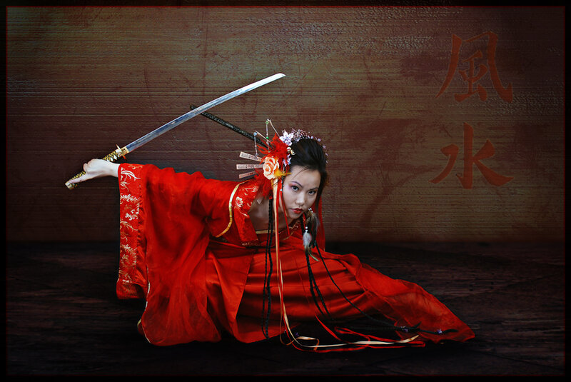 Woman in red with sword