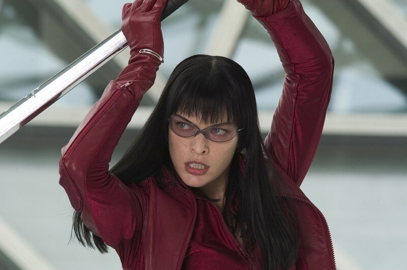 Woman in red with sword