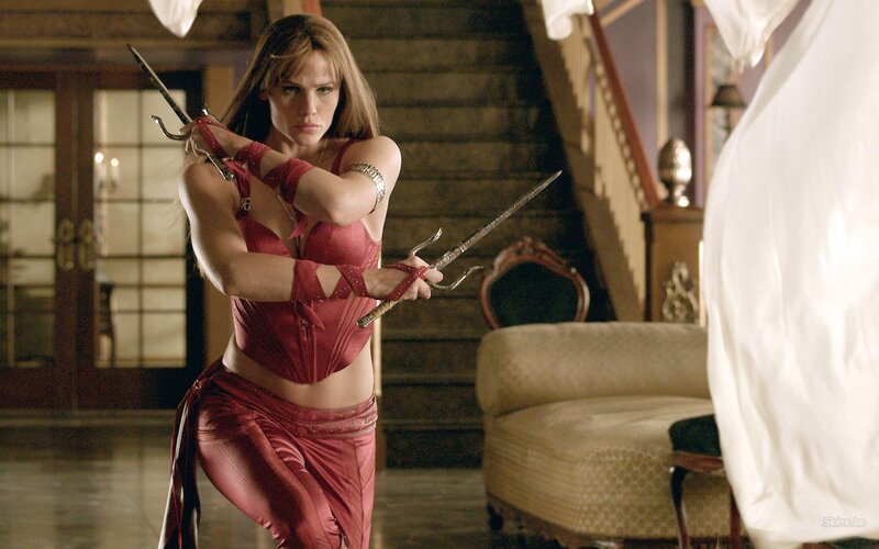 Woman in red with swords
