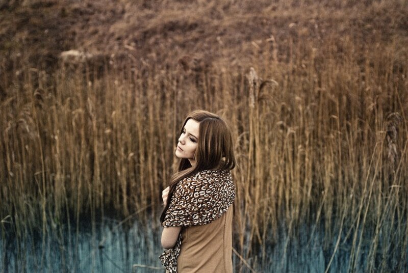 Woman in Reed Field — Brown