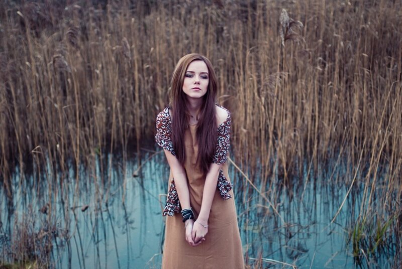 Woman in Reeds — Brown