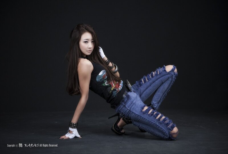 Woman in Ripped Jeans — Black, Dramatic, Photograph, Gloves