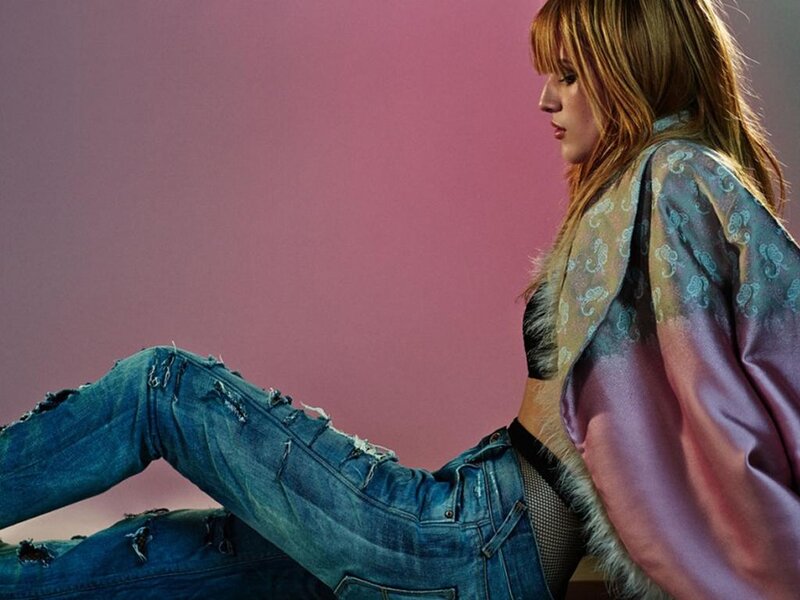 Woman in Ripped Jeans — Pink