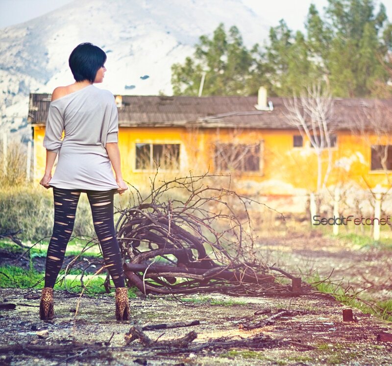 Woman in ripped leggings