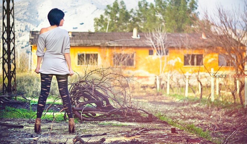 Woman in ripped leggings