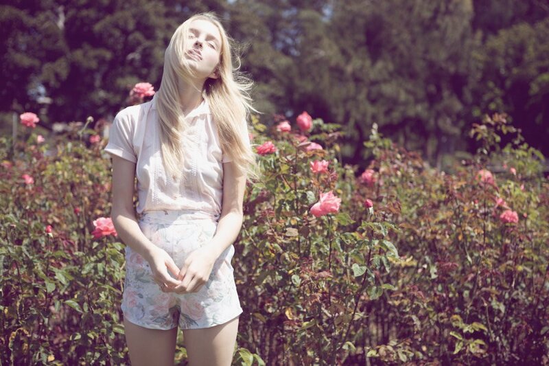 woman in rose garden