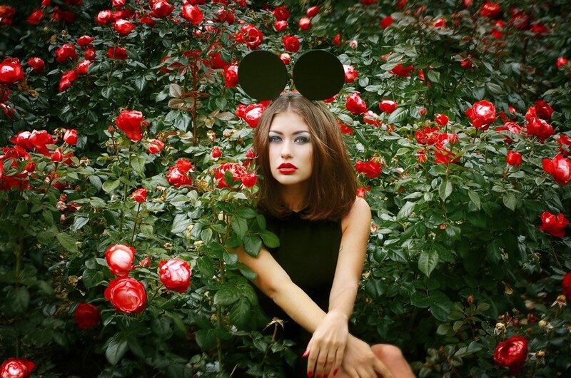 Woman in Rose Garden — Red, Dramatic