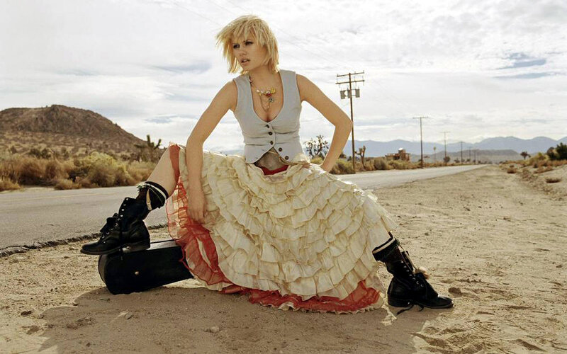 woman in ruffled skirt on roadside