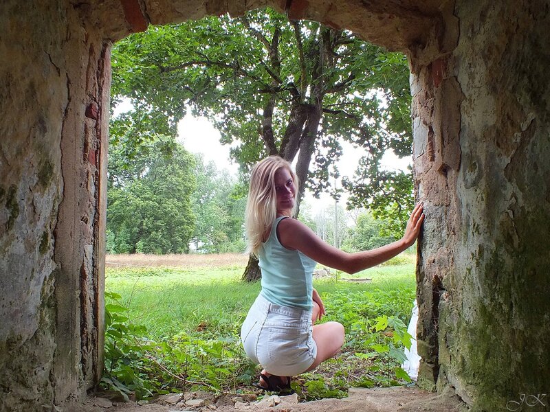 Woman in Ruined Doorway