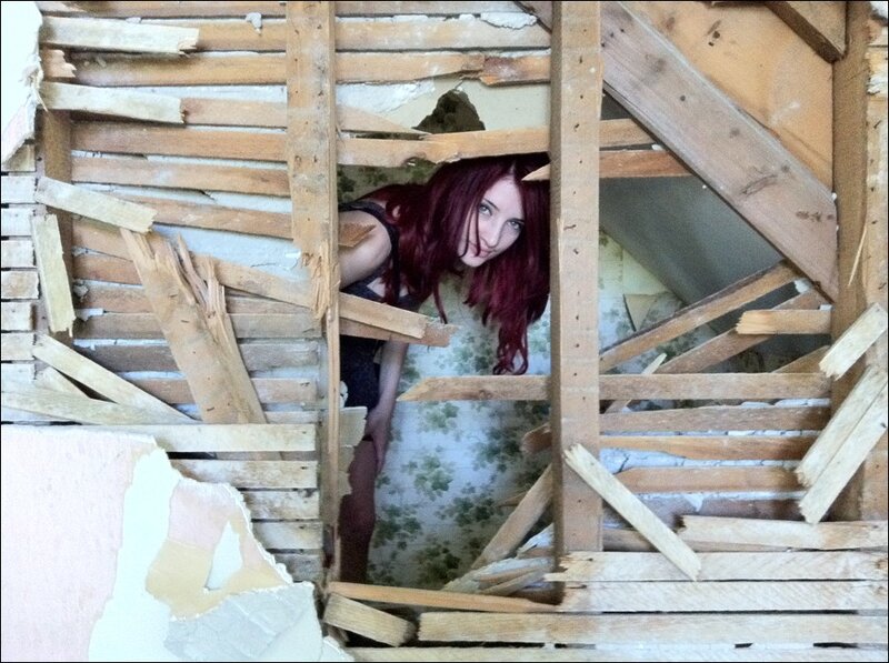 woman in ruined room
