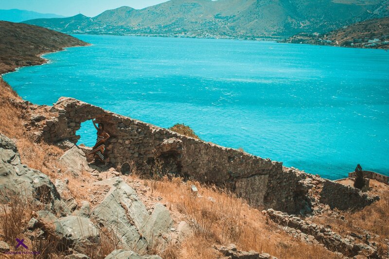 Woman in Ruins by Sea