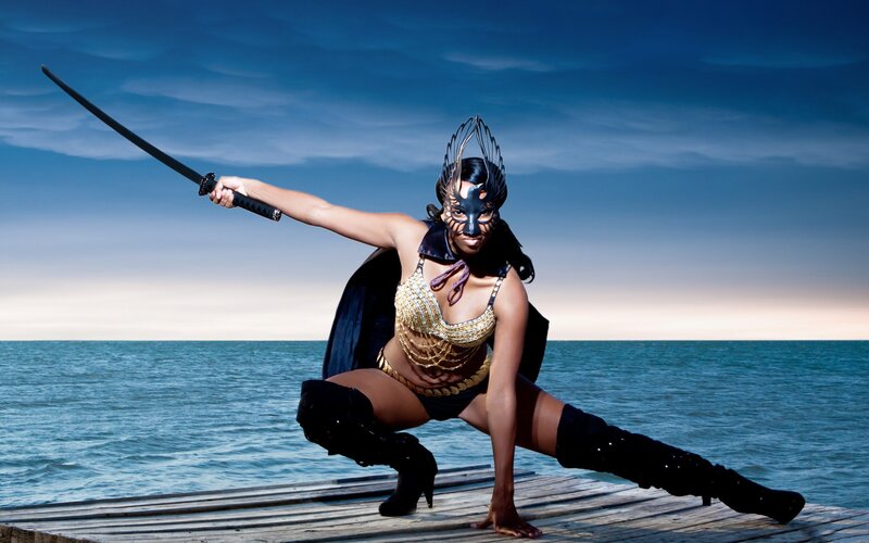 woman in samurai costume on dock