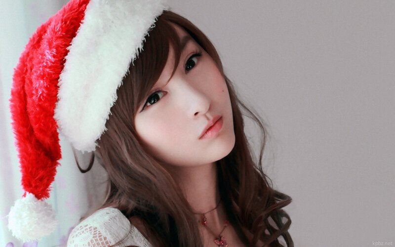 woman in santa hat