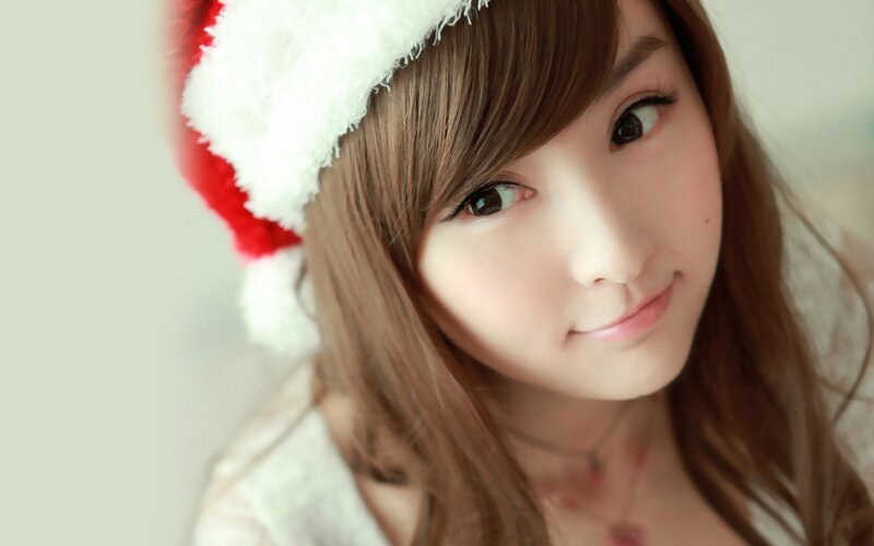 woman in santa hat