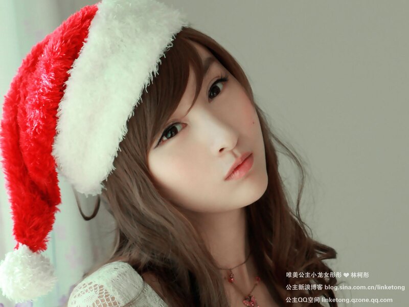 Woman in Santa hat