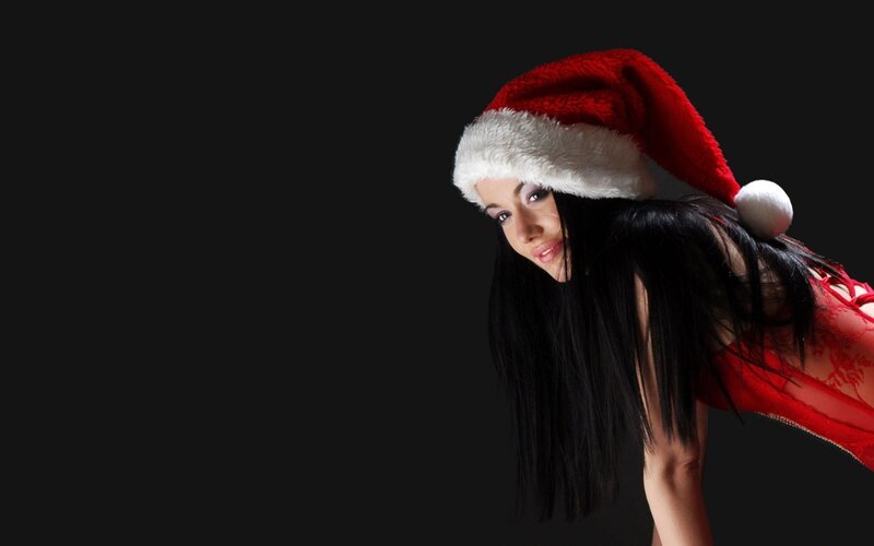 woman in santa hat posing