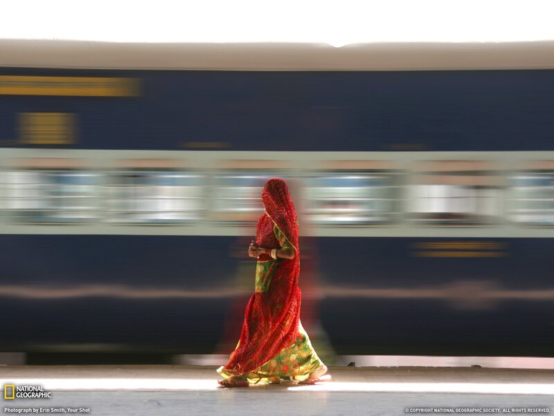 Woman in sari at train station