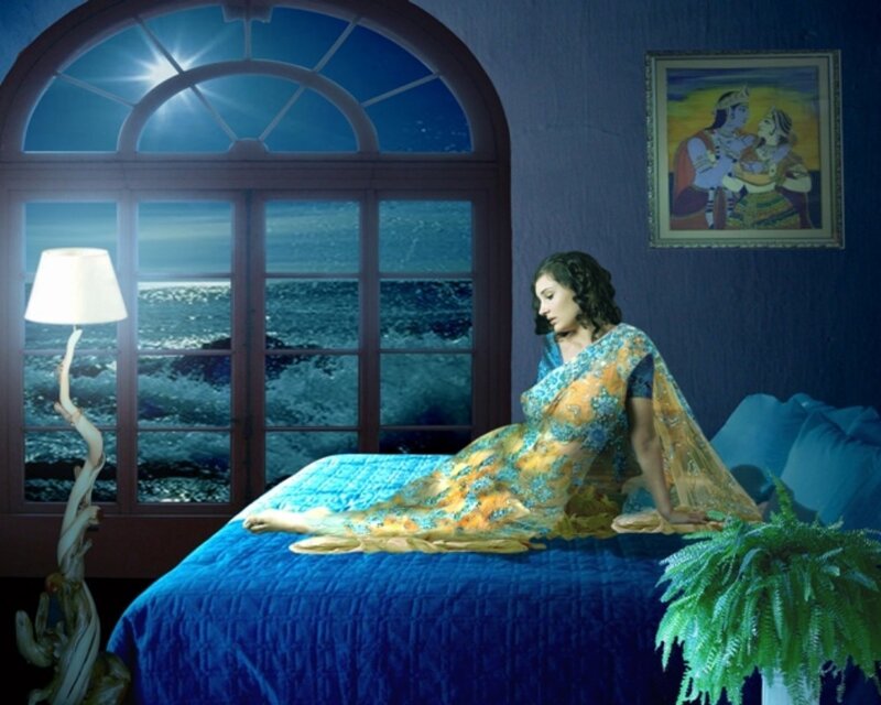 Woman in Sari on Bed