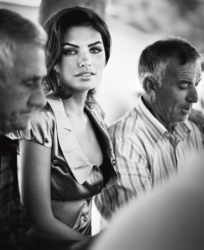 woman in satin blouse at event