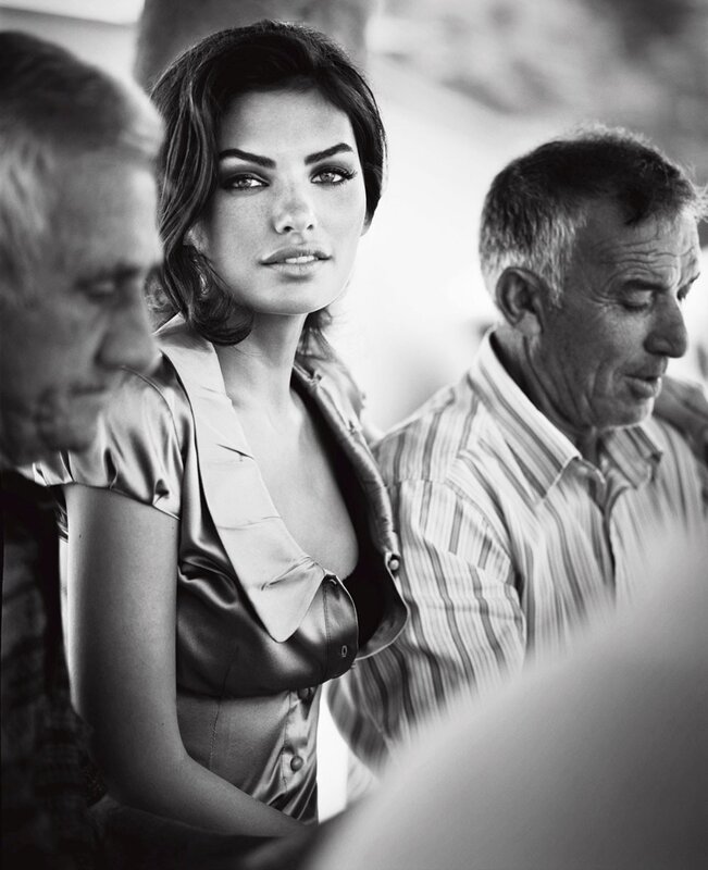 woman in satin blouse at event