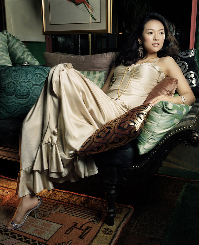 woman in satin dress on chaise lounge