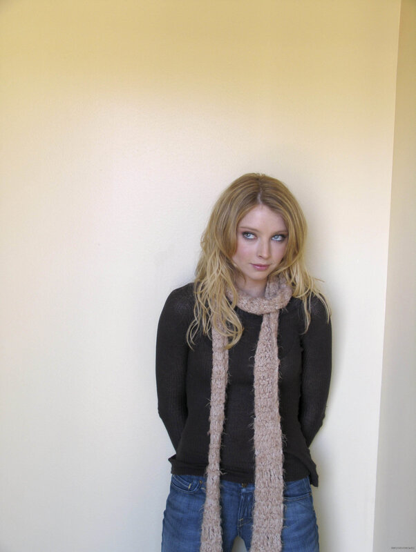 woman in scarf and sweater