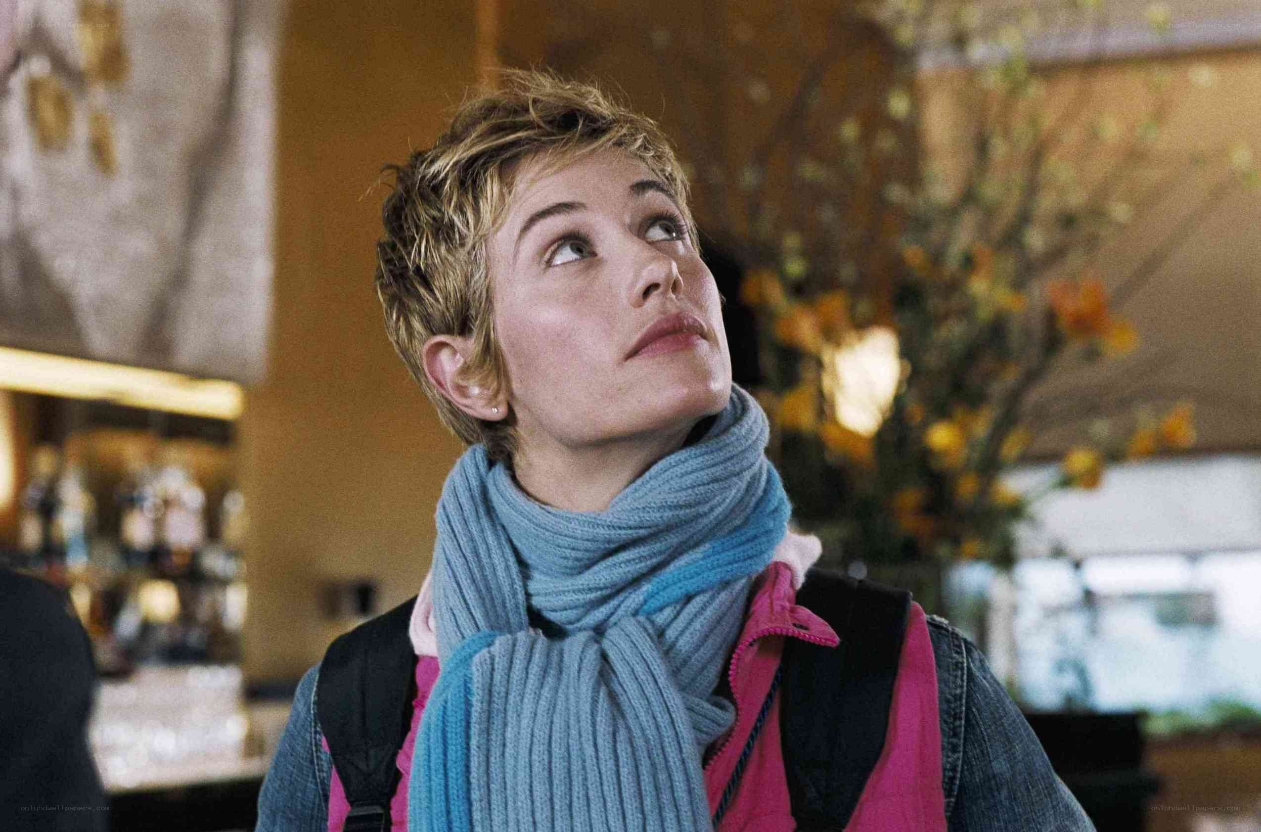 woman in scarf looking up