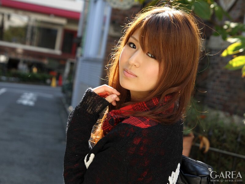 woman in scarf on street