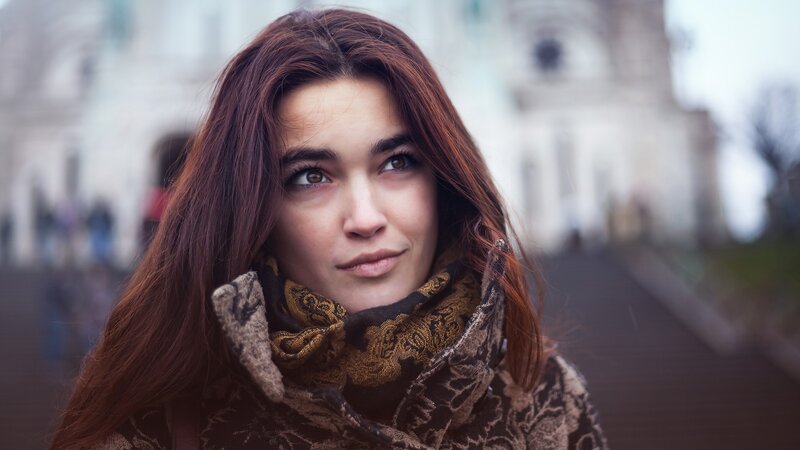 woman in scarf on street