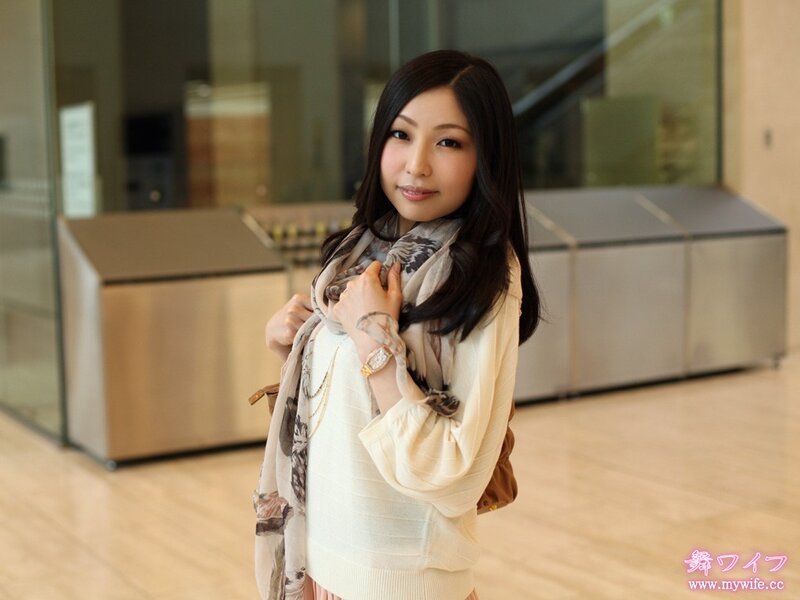 woman in scarf smiling