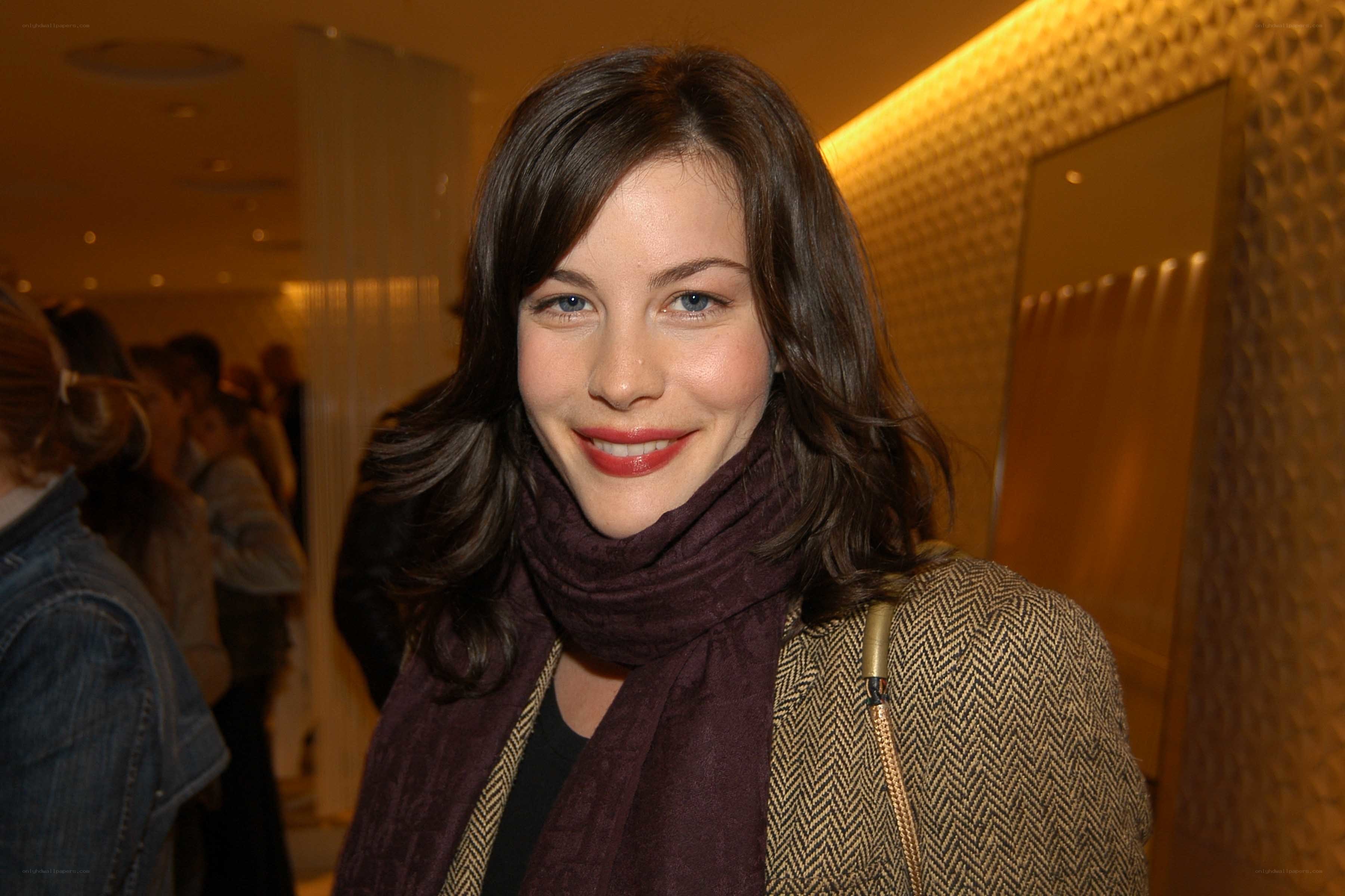 woman in scarf smiling