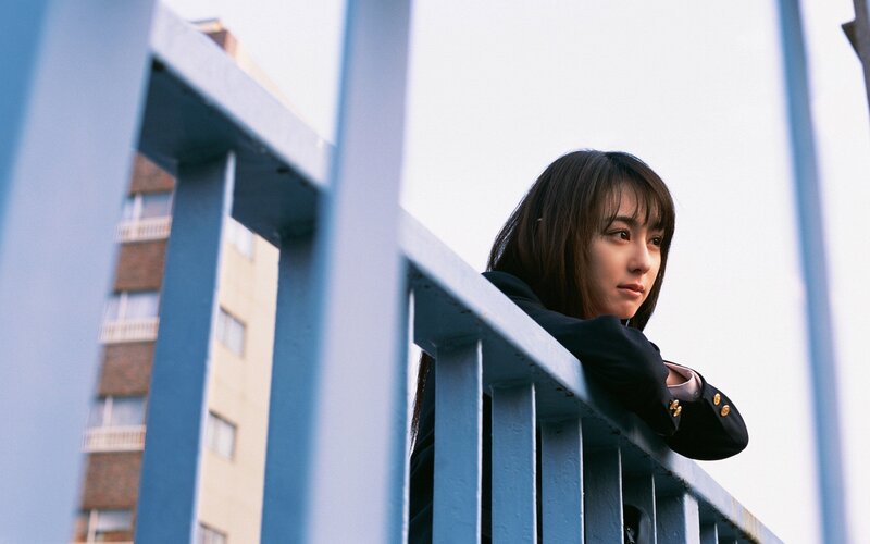 Woman in School Uniform — Blue, Contemplative