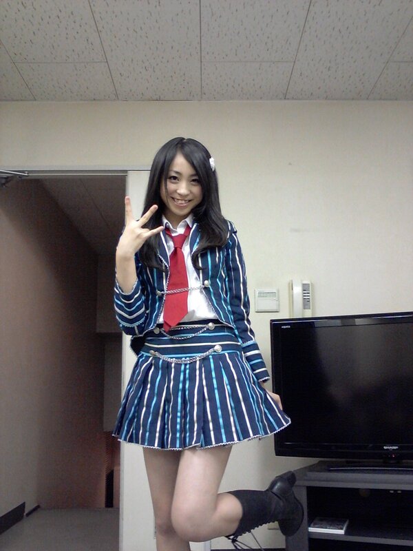 Woman in School Uniform — Blue, Playful, Photograph, Television
