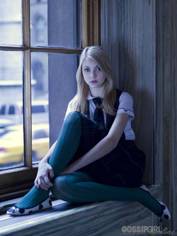 woman in school uniform by window