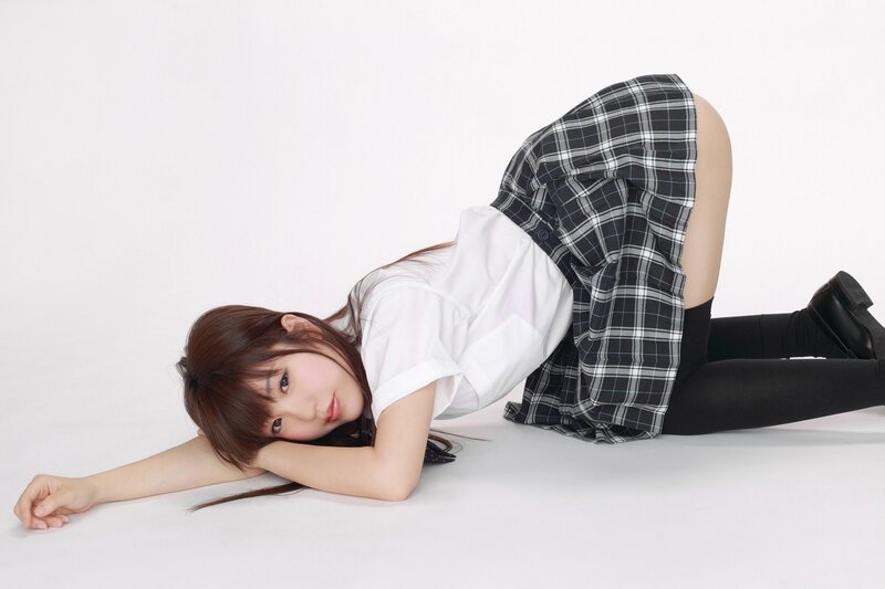 woman in school uniform lying on floor