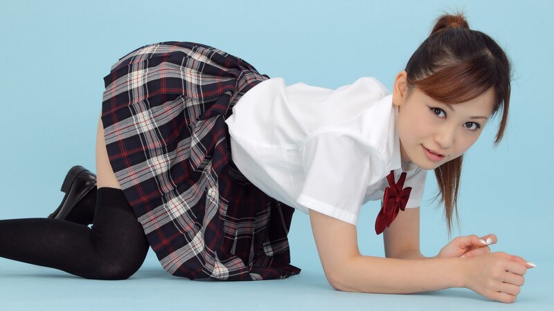 woman in school uniform on floor