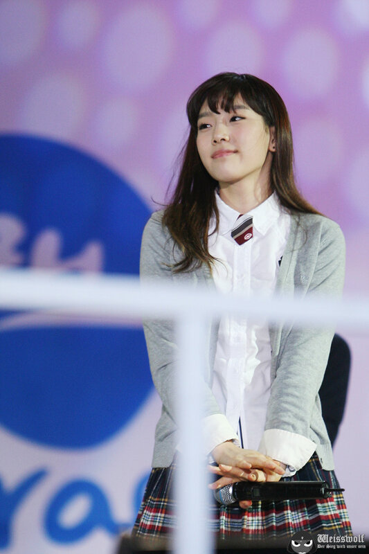 woman in school uniform on stage