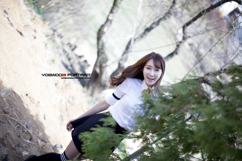 woman in school uniform outdoors
