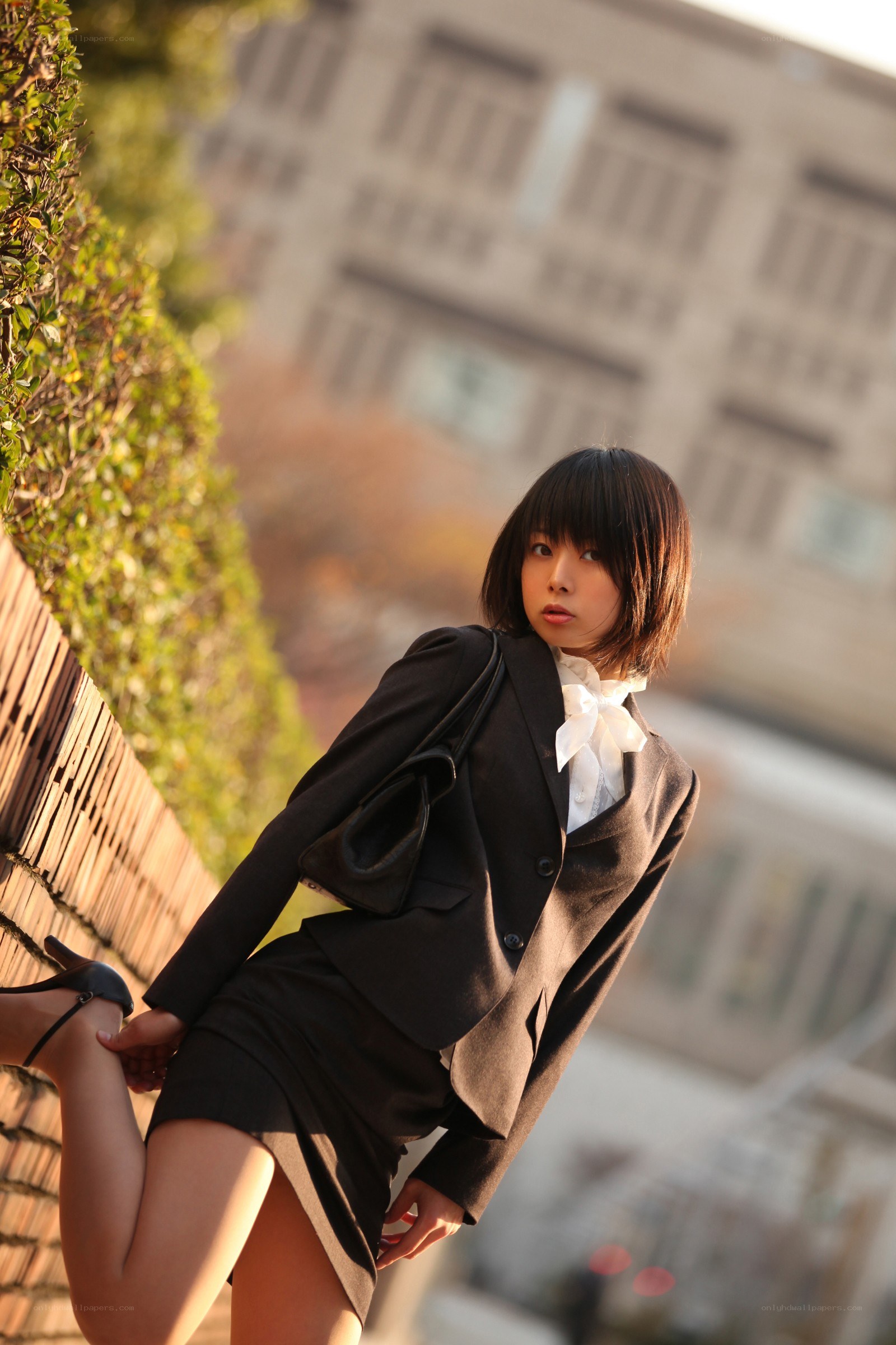 woman in school uniform posing