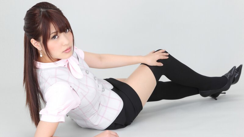 woman in school uniform posing