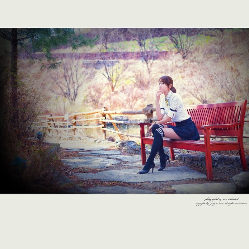 Woman in School Uniform — Red, Serene