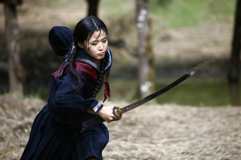 Woman in school uniform with sword