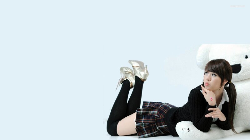 woman in school uniform with teddy bear