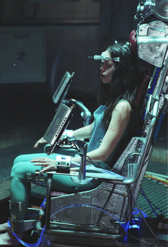 woman in sci-fi medical chair